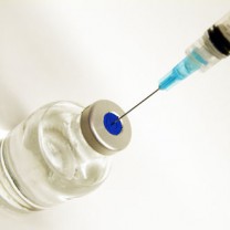 Vaccinspruta fylls på