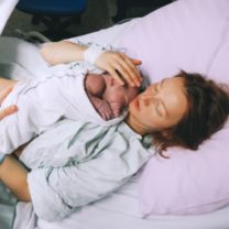 mother-holding-her-newborn-baby-child-after-labor-in-a-hospital-picture