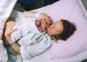 mother-holding-her-newborn-baby-child-after-labor-in-a-hospital-picture